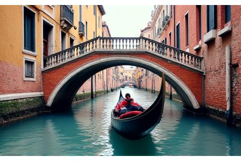 Gondola gliding through a canal in Venice, Italy, with historic buildings.